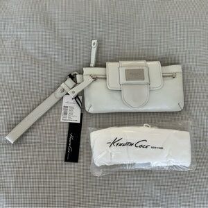 NWT Kenneth Cole white leather clutch! Multiple compartments and dust bag!